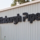 Side view of pittsburgh pipe sign