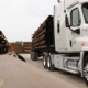 close up view of truck carrying pipes