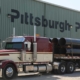 truck parked in front of pitts pipe building