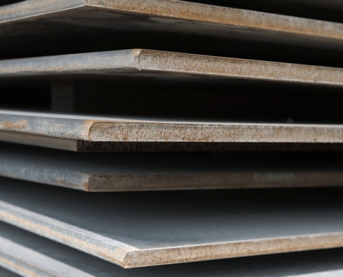 Close up stack of steel road plates