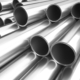 Close up of a pile of steel pipes